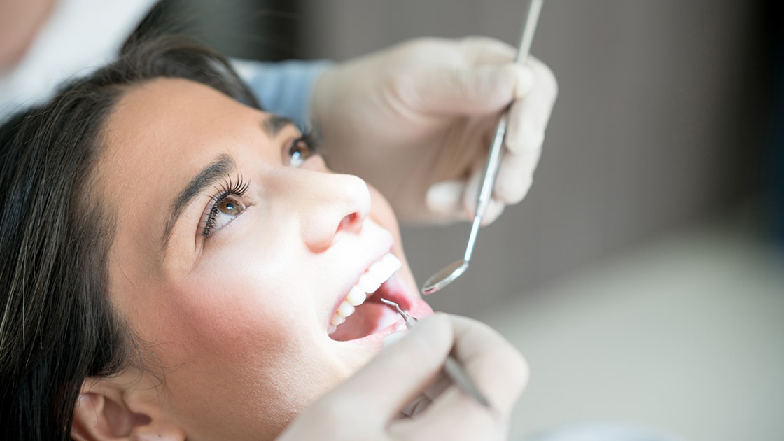 woman getting fluoride treatment