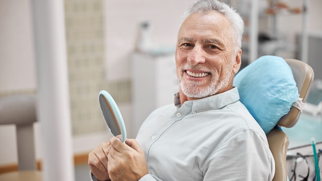 Man smiling after treatment